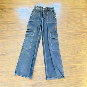 Ganni black cargo jeans with brown stitching and pockets in thighs